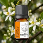 Olejek eteryczny Neroli AromatherapyOils 5 ml na tle kwiatów gorzkiej pomarańczy Citrus aurantium